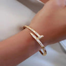 BRACELETE ZIRCONIA PREGO COM FAIXAS OVAIS CRAVEJADAS